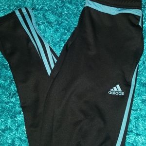 Black and blue adidas pants